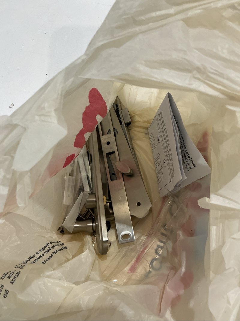 Condition photo showing As Is for serenade mortise keyed lever mount latch with deadbolt for screen and storm doors, satin nickel