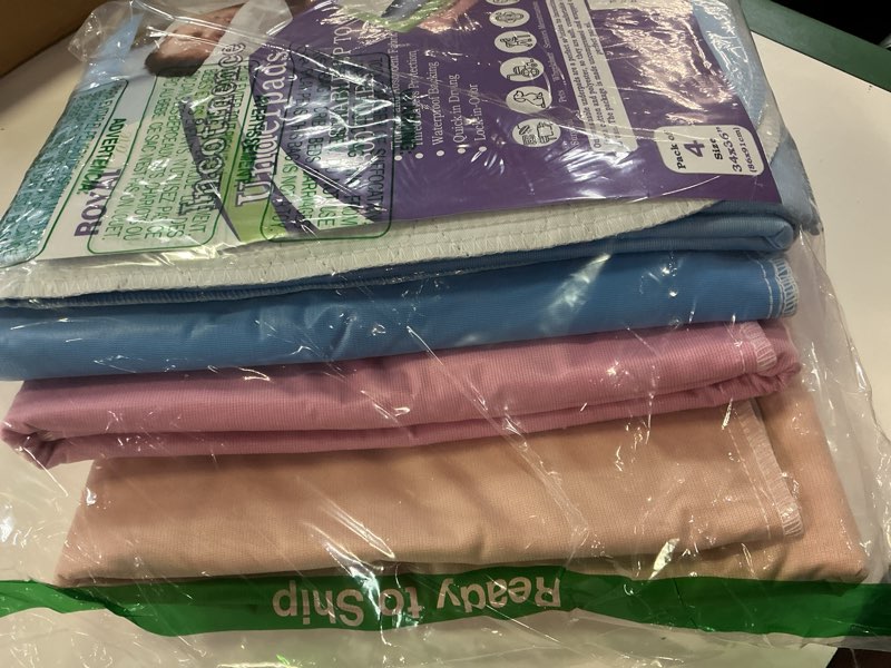Condition photo showing Good Condition for incontinence bed pads - 4 pack 34" x 36" reusable waterproof mattress protectors - highly absorbent, machine washable - for children, pets and seniors - multi color - royal care 34x36 inch (pack of 4) multicolor
