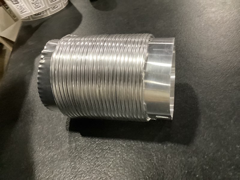 Condition photo showing As Is for lambro rigiflex semi-rigid silver flexible duct with quick connect collars for laundry closet installations