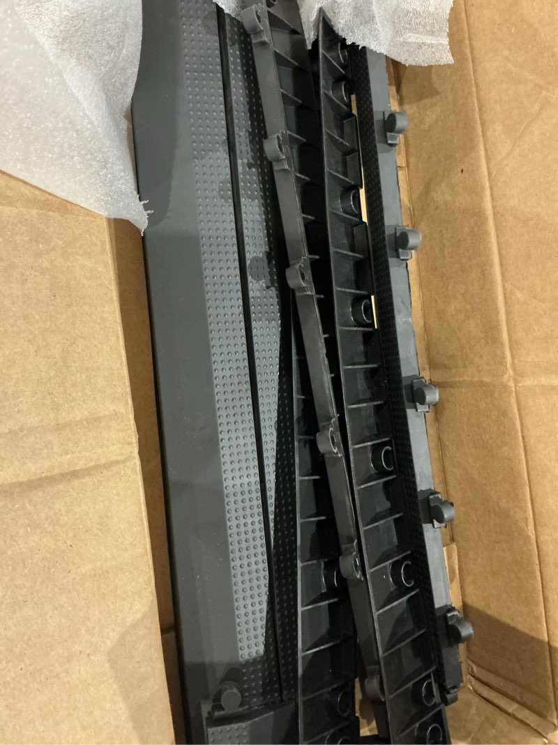 Condition photo showing As Is for baselayer interlocking floor tile trim pieces - beveled edges and corners - durable ½ in tpe (rubber like, not foam, no odor) - 10 edges and 4 corners - made in usa edges & corners 14