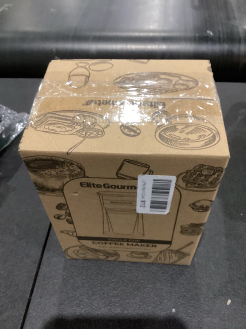 Condition photo showing As Is for Elite Gourmet EHC113 Personal Single-Serve Compact Coffee Maker Brewer Includes 14Oz. Stainless Steel Interior Thermal Travel Mug, Compatible with Coffee Grounds, Reusable Filter, Black