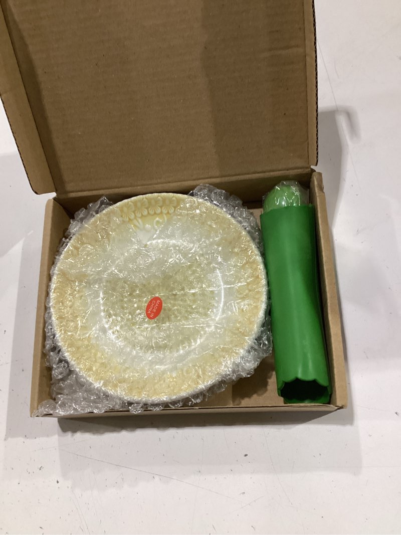 Condition photo showing New/Like New for boncera, all-in-one premium ceramic garlic grater plate 4-piece set - yellow embossed design and style - for garlic, ginger, chocolate, and more! - comes with 5.25" plate, peeler, brush, and stand