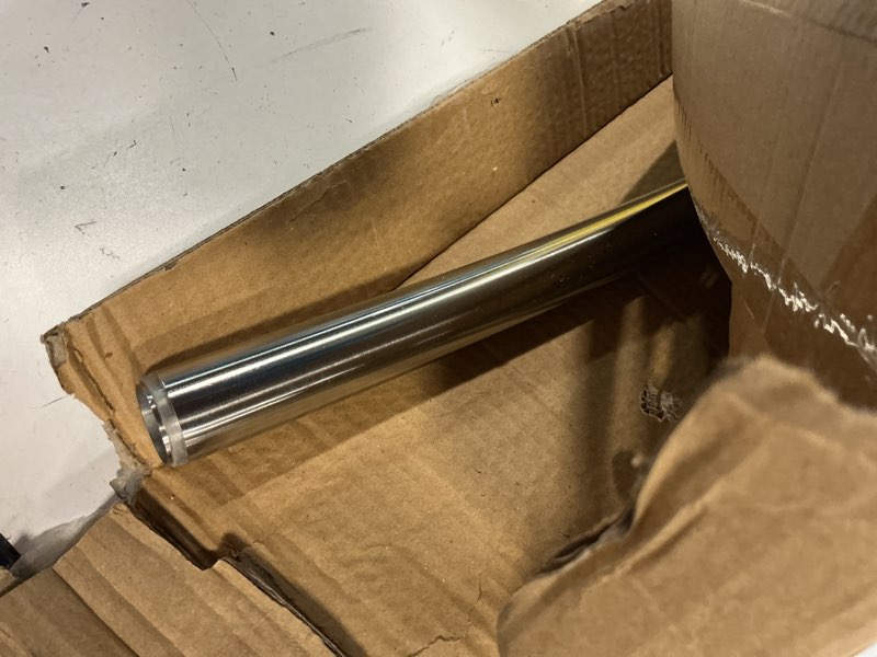 Condition photo showing As Is for chrsouly adjustable curved shower rod, 42-72 inches extra wide shower curtain rod, rust proof, premium stainless steel, curved shower curtain rod for bathroom, need to drill, silver silver 42-72 inches