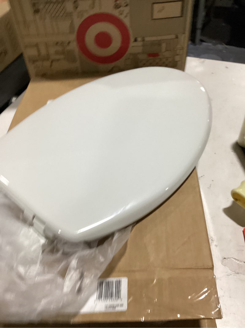 Condition photo showing As Is for mayfair caswell modern slow close toilet seat, durable plastic, elongated, white elongated 1