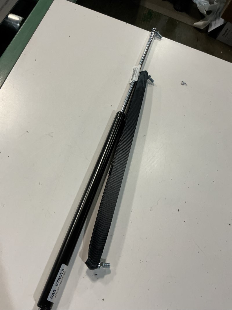 Condition photo showing As Is for arana gas struts 30 inch 150lb with brackets (2 pack) - heavy duty lift support for rv bed hatch & basement door - hydraulic spring shocks for large trailer lid, cellar door, food truck window 30" 150lb high quality 45th carbon steel