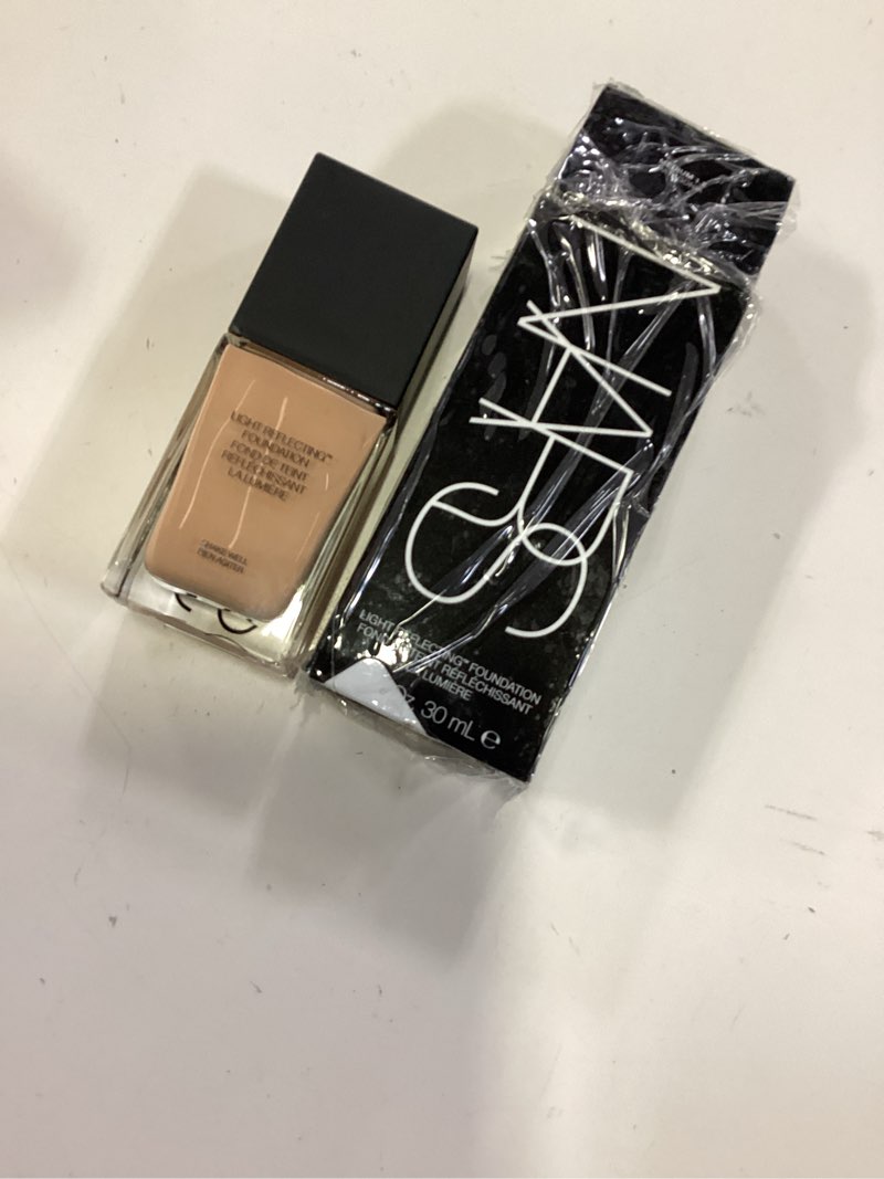 Condition photo showing New/Like New for light reflecting foundation - m1.2 patagonia by nars for women - 1 oz foundation