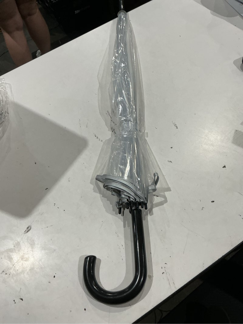 Condition photo showing Good Condition for rain essentials 52" in stick umbrella // clear black - “available for in-store purchase only”