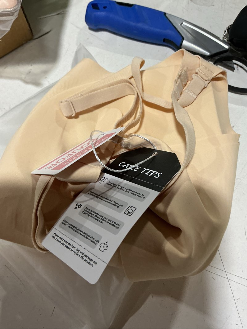 Condition photo showing New/Like New for seamless low back bra wireless padded bralette thin straps comfort halter backless cross multiway convertible bras medium u-nude