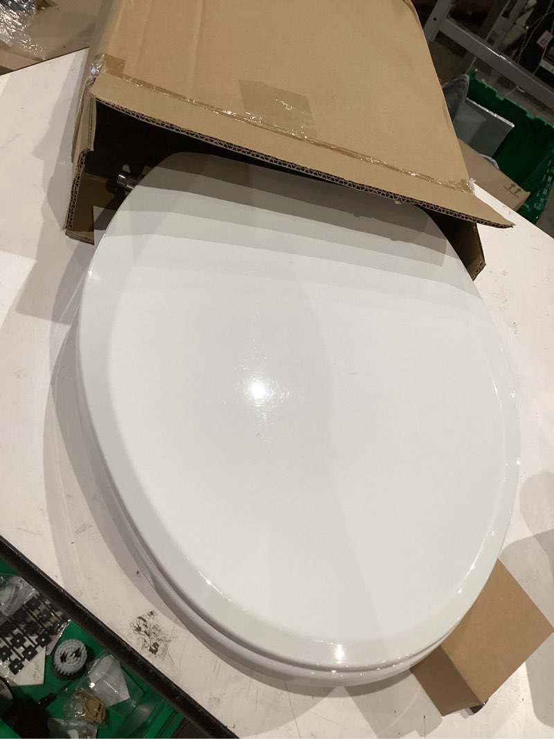 Condition photo showing Good Condition for clirass bidet toilet seat, soft close toilet seat, button control feminine/posterior wash switch, knob control water pressure,white bidet seat attachment with brass inlet (elongated-d) elongated-semi-oval button