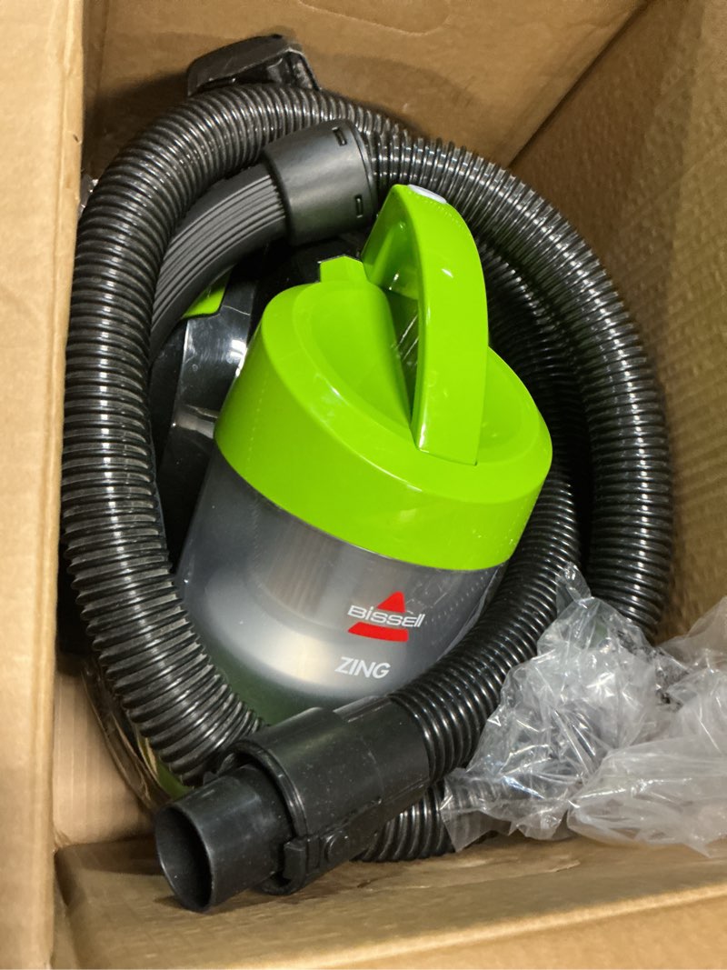 Condition photo showing As Is for bissell 2156a zing canister bagless vacuum zing canister lime