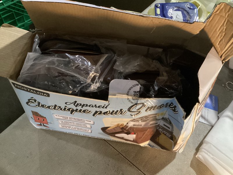 Condition photo showing Good Condition for Nostalgia Tabletop Indoor Electric S'mores Maker - Smores Kit With Marshmallow Roasting Sticks and 4 Trays for Graham Crackers, Chocolate, and Marshmallows - Movie Night Supplies - Brown S'mores Maker Brown