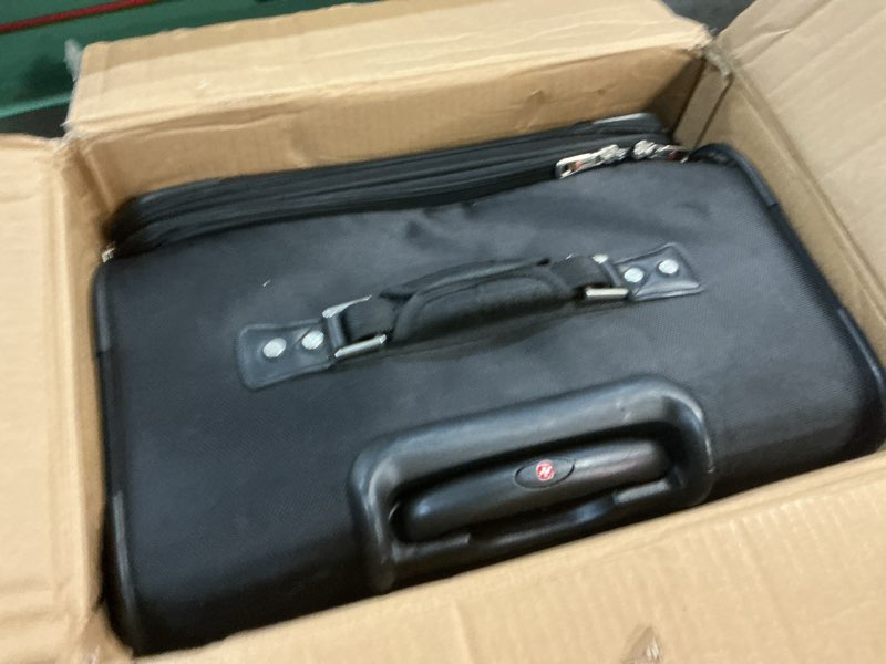 Condition photo showing New/Like New for swissgear sion softside expandable luggage – large checked suitcase with 360 degree wheels & retractable handle – 29 inch, perfect for 7-9 night trips – black checked-large 29-inch black