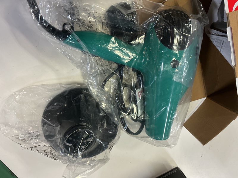 Condition photo showing New/Like New for revlon 1875w ionic volume booster hair dryer, green