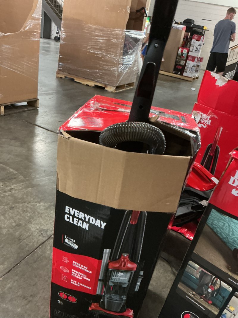 Condition photo showing As Is for dirt devil - ud20124v - endura reach upright bagless vacuum