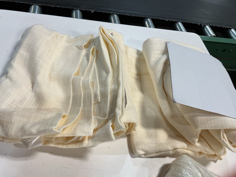 Condition photo showing Good Condition for quince sheer curtian 48”x96” in ivory set of 2