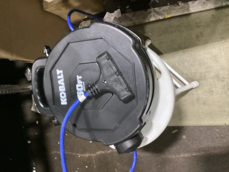 Condition photo showing As Is for kobalt 50 ft retractable cord reel