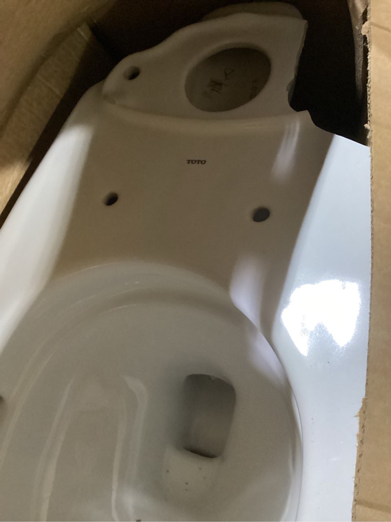 Condition photo showing As Is for toto drake two-piece elongated 1.6 gpf universal height tornado flush toilet with cefiontect, cotton white - cst776csfg#01