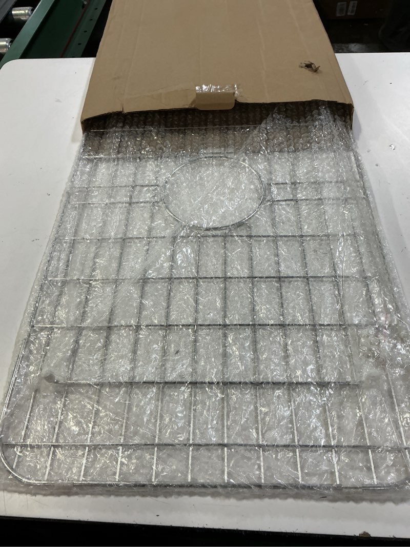 Condition photo showing Good Condition for sink bottom grid 27-1/2" x 14-1/4", centered drain with corner radius 3-1/2" (27-1/2" x 14-1/4" center drain) - for single bowl kitchen sink