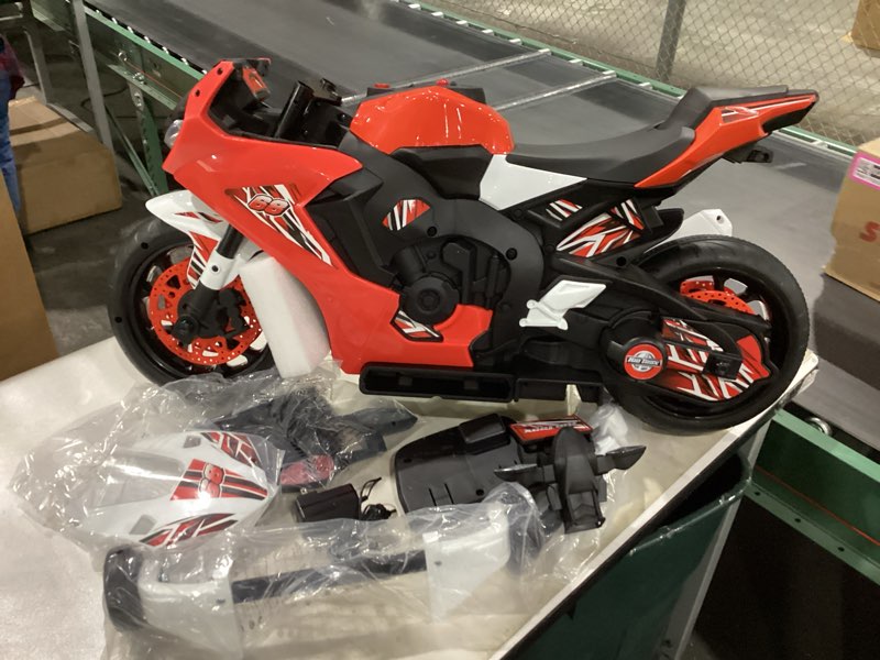 Condition photo showing New/Like New for Kid Trax 6V Glow Electric Toddler Kids Motorcycle - Toddler Bike, Indoor/Outdoor Toys, Durable, LED Headlights and Body Light, Realistc Sounds, Kids Ride On Toys, Max Weight 65lbs, Ages 3-6, RED