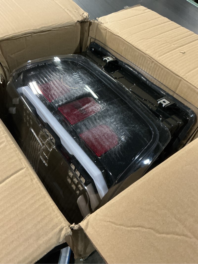 Condition photo showing As Is for paanlok restyle led tail lights for 2014-2019 chevy silverado 1500/2500/3500 & 2015-2019 gmc sierra 