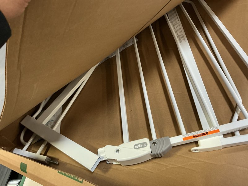 Condition photo showing As Is for Regalo Safety 38" Baby Gate for Doorways & Bottom of Stairs, Pressure Mount Design for Babies, Toddlers & Pets, Tested & Safe for 30 Years, American Designed, American Owned, White White 29-38.5"W x 30"H