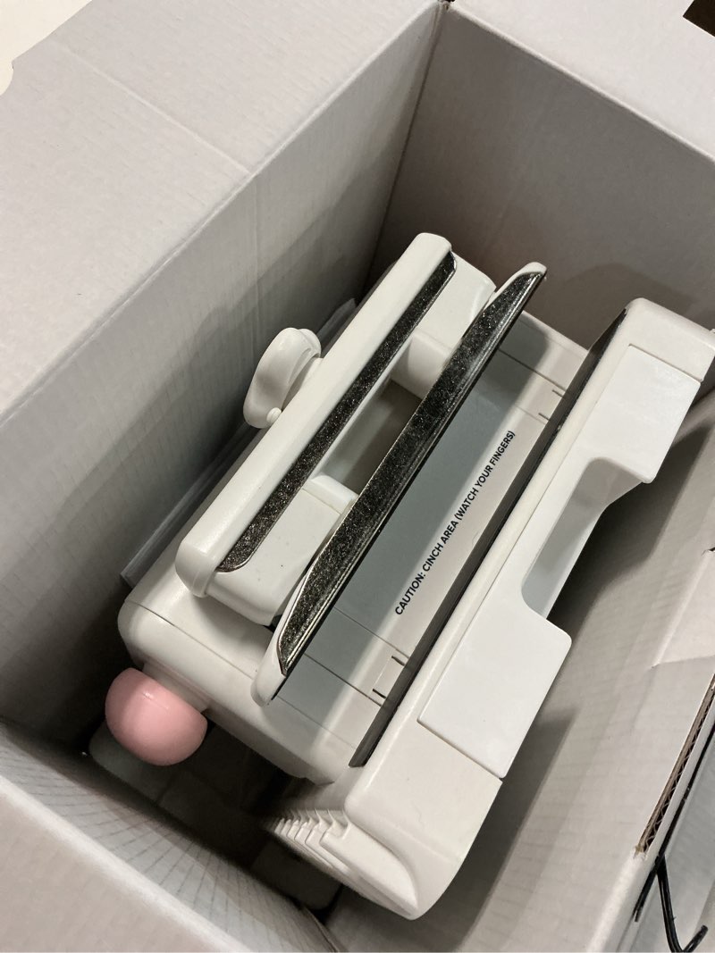 Condition photo showing Good Condition for we r memory keepers, cinch book binding machine 2, pink/white, easy to use design with slide ruler, compatible with wire or spiral coils, make professional books, notebooks, calendars and more | by we r memory keepers square holes