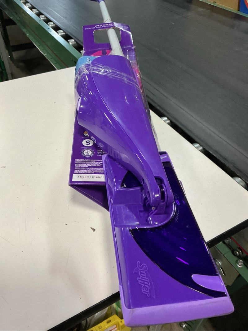 Condition photo showing As Is for swiffer wetjet 11 in. w wet mop kit