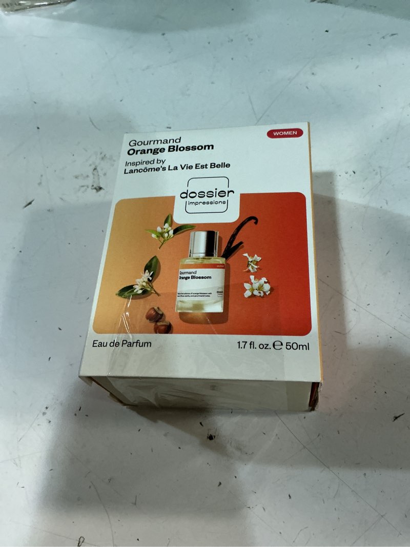 Condition photo showing Good Condition for dossier - gourmand orange blossom - eau de parfum - inspired by la vie est belle - long-lasting fragrance - feminine - 1.7 fl oz (50ml)