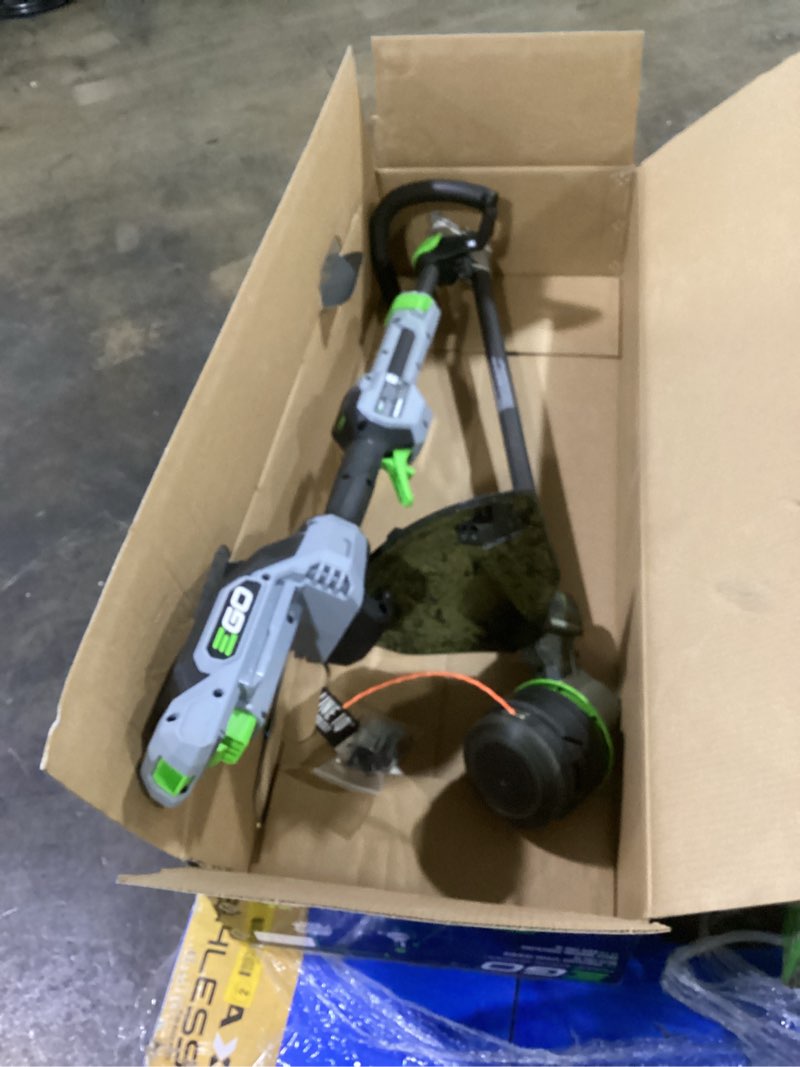 Condition photo showing As Is for ego power+ line iq with powerload st1623t 16 in. 56 v battery string trimmer kit (battery & charger) w/ telescopic shaft & 4.0 ah battery
