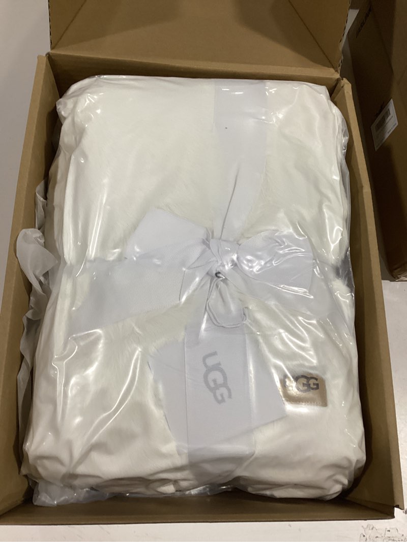 Condition photo showing New/Like New for UGG Euphoria Plush Faux Fur Throw Blanket Medium Weight Reversible Luxury Soft Throw for Couch Bed or Chair Hypoallergenic Machine Washable Home Decor Fluffy Blanket, 50-inch x 70-inch, White Snow