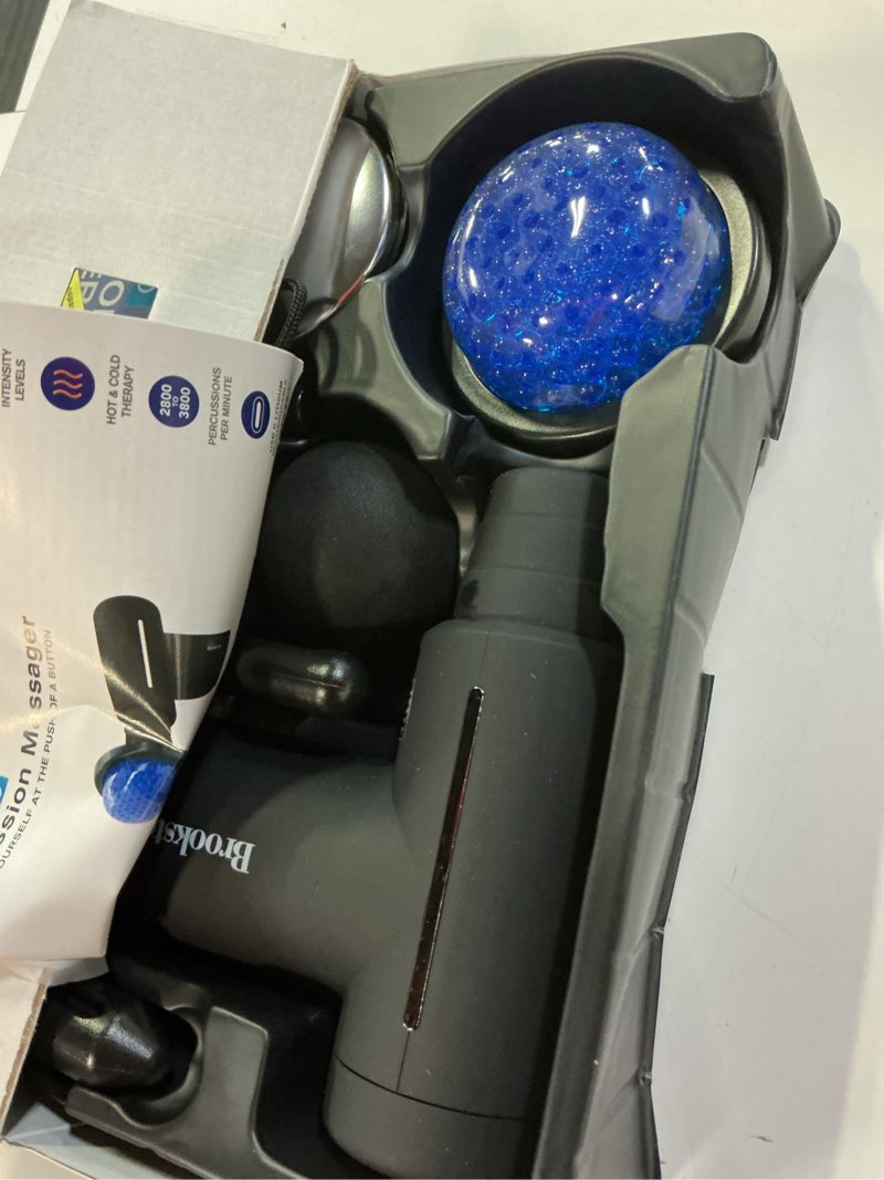 Condition photo showing As Is for brookstone cordless hot and cold percussion massager, 6 intensity levels, deep tissue massage gun