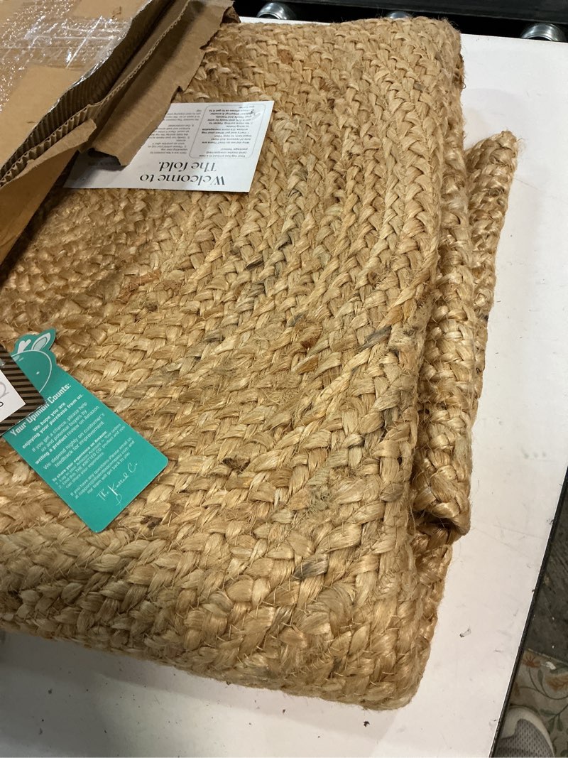 Condition photo showing Good Condition for 100% jute round area rug - 5 feet, natural fibers, braided design, hand woven carpet - home decor for living room, hallways, bedroom 5' (round) natural
