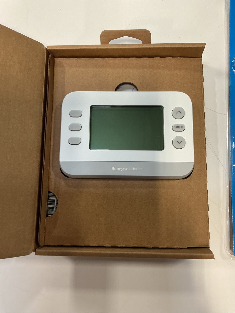 Condition photo showing As Is for New! Honeywell Home Programmable Thermostat, Single-Stage, 1 Heat/1 Cool Compatibility, Flexible Schedule, X2P, White, RTH21B Single-Stage Compatible 7 Day Flexible Programmable