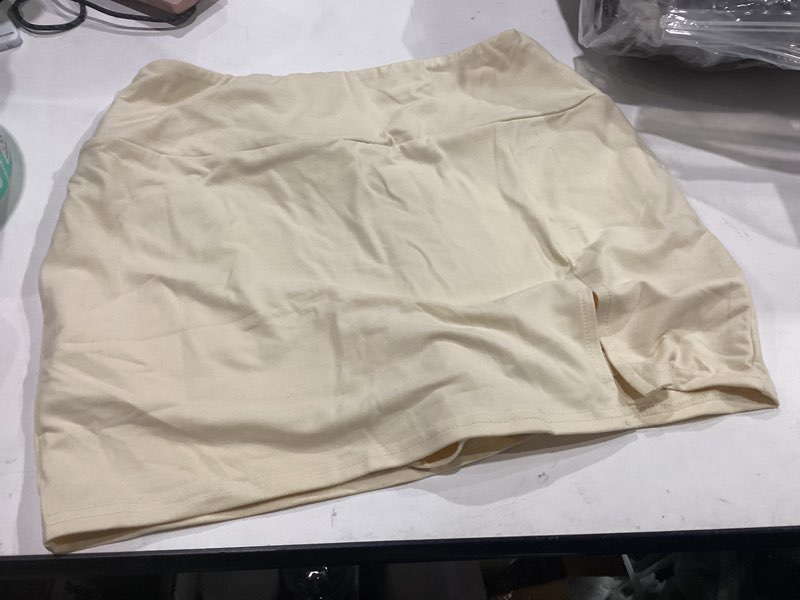 Condition photo showing New/Like New for doomoni women's side slit high waisted mini skirt stretchy bodycon skort 2026 y2k club skirts with underneath light yellow medium