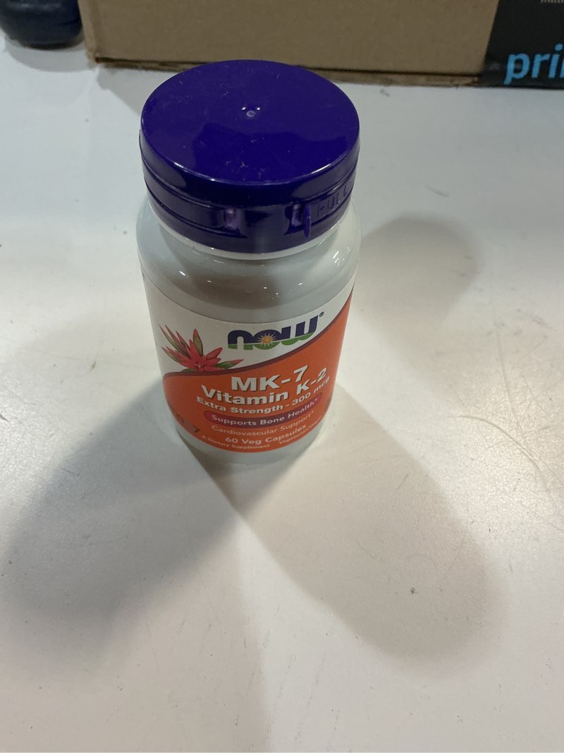 Condition photo showing item condition for ( best by:04/2026)  2 pack NOW Foods Supplements, Vitamin K2 (MK-7) 300 mcg, Extra Strength, Supports Bone Health*, 60 Veg Capsules 60 Count (Pack of2)