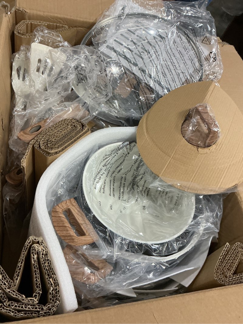 Condition photo showing Good Condition for 24 pcs pots and pans set non stick ceramic cookware set with 3 stockpots, white interior black exterior, healthy non-toxic, large capacity, induction compatible, pfas/ptfe/pfoa free 24pcs set black/white