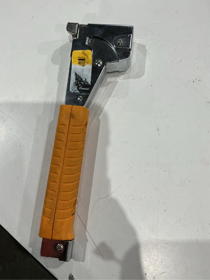 Condition photo showing As Is for arrow ht50 heavy duty hammer tacker, chromed-steel manual stapler with sure-grip handle, dual-capacity rear-load magazine, fits 5/16”, 3/8", or 1/2" staples