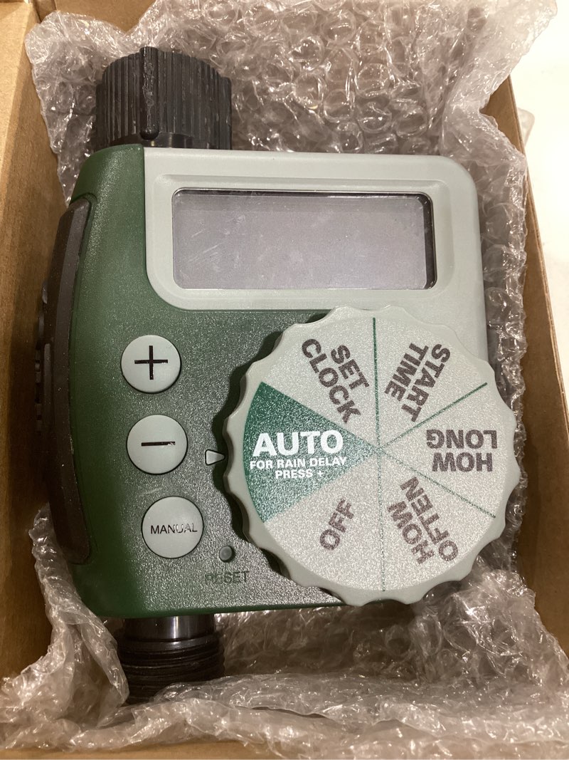 Condition photo showing As Is for orbit programmable digital hose watering timer - 1 outlet - battery powered - with lcd screen - built-in rain delay - water-resistant - 62061