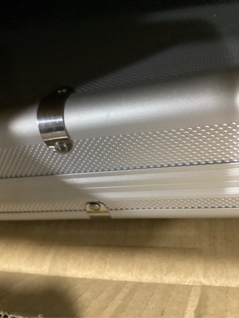Condition photo showing Good Condition for doitool metal briefcase,silver aluminum briefcase with lock,hard case locking case,portable carrying case,metal with ripple foam,14.15x7.86x2.95 inch white