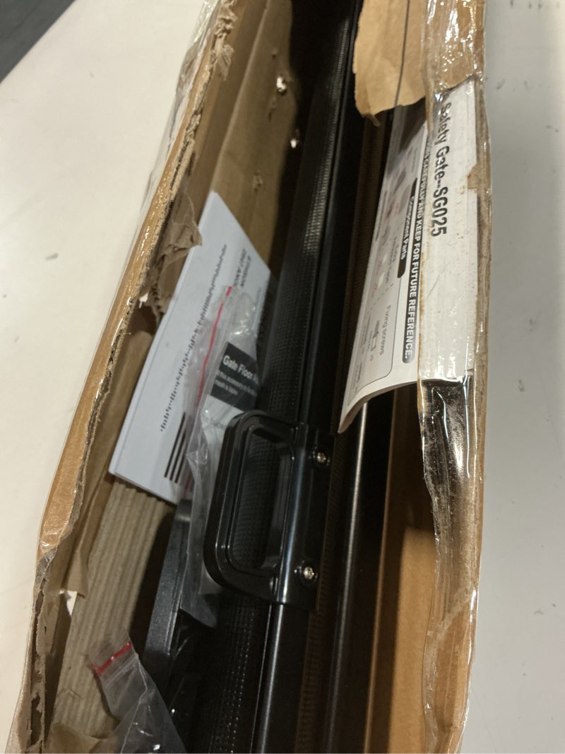 Condition photo showing As Is for retractable baby gates for stairs, 55"wide x 34"tall mesh baby gate with anti-crawling hook, adjustable baseboard bracket, child gate for hallways, doorways, kitchen, indoor & outdoor, black black 55"wide x 34"tall