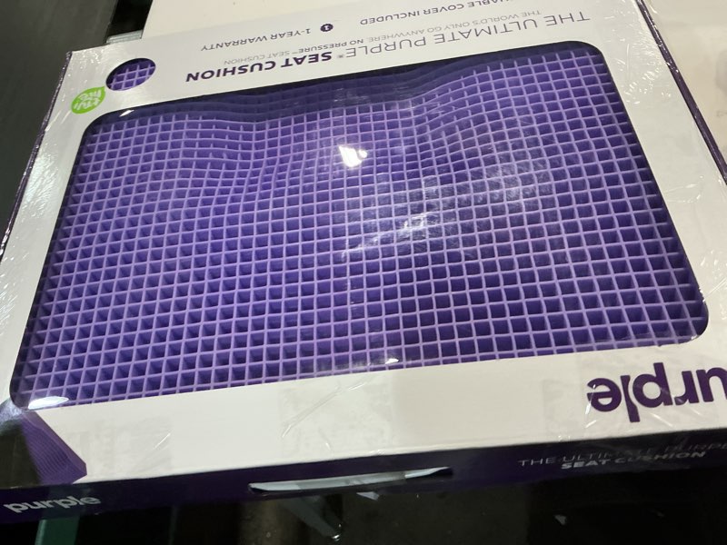 Condition photo showing New/Like New for purple ultimate seat cushion | pressure reducing grid designed for ultimate comfort | designed for gaming | made in the usa