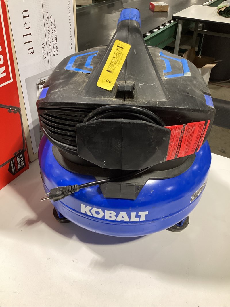 Condition photo showing As Is for kobalt 6-gallon portable electric 175 psi pancake air compressor