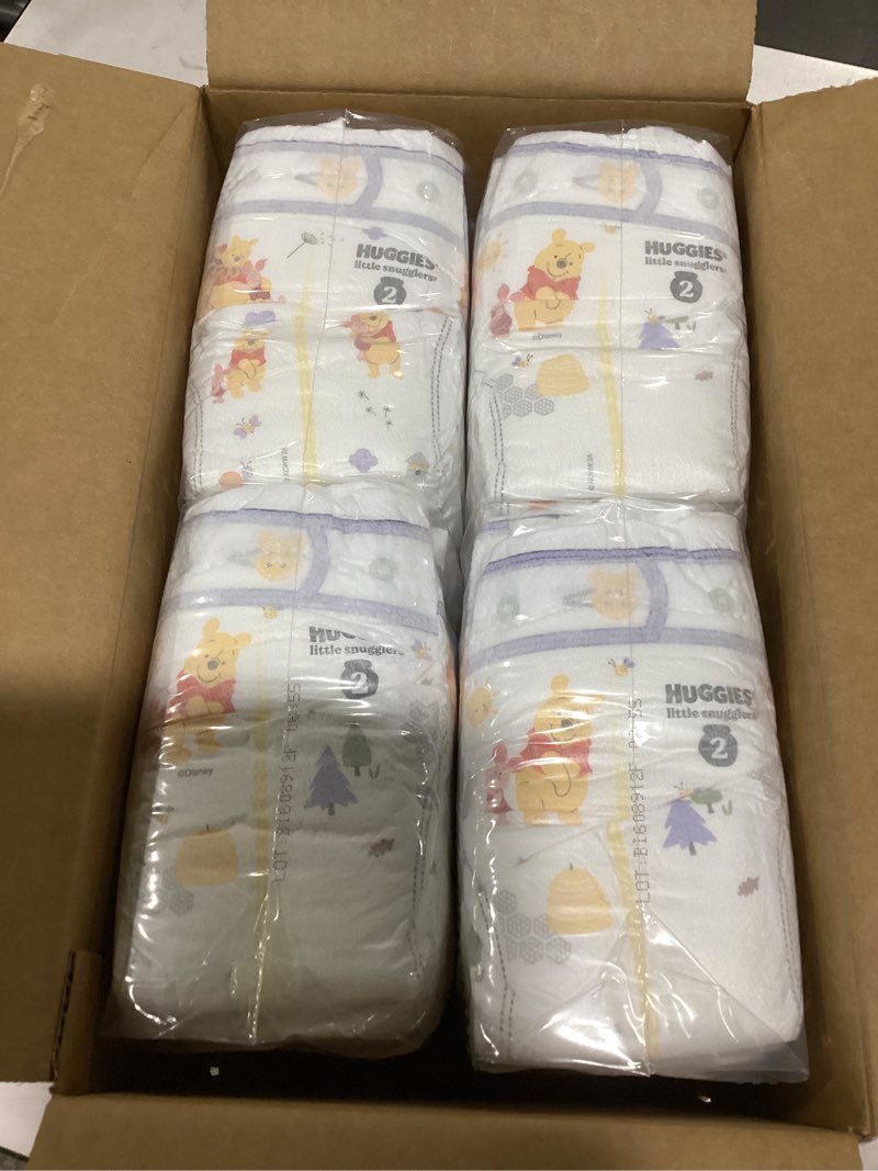 Condition photo showing Good Condition for huggies size 2 diapers, little snugglers baby diapers, size 2 (12-18 lbs), 84 count, packaging may v