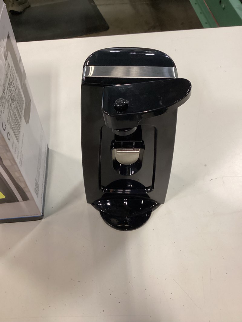 Condition photo showing New/Like New for mainstays can opener and knife sharpener, bottle opener with removable cutting lever black