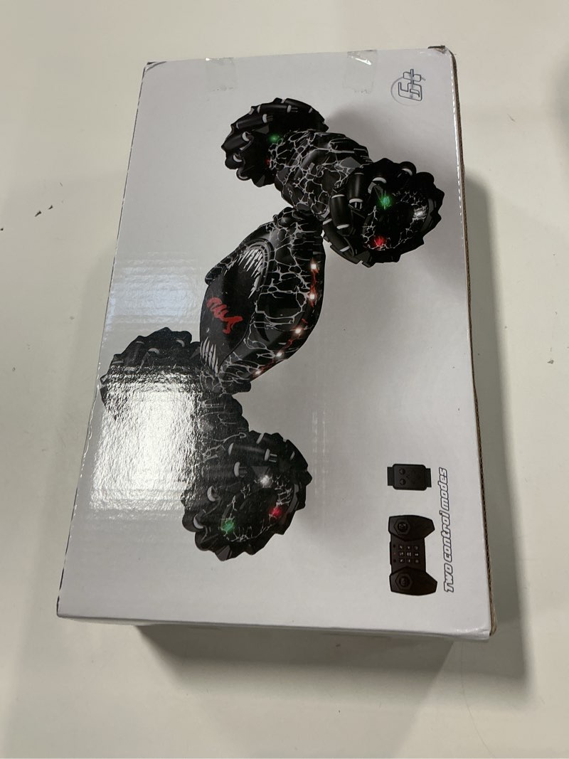 Condition photo showing New/Like New for Remote Control Car, 2.4Ghz 4WD Gravity Gesture Sensing RC Cars, Monster Stunt Twist Truck Kids Toys for 5-7 yr Boys & Girls, RC Drift Car with Light Music Gift for Boy Toys Age 8-13 yr Black