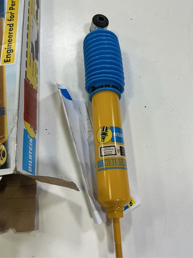Condition photo showing New/Like New for bilstein 24-013284 front shock for ford f150 2wd , yellow