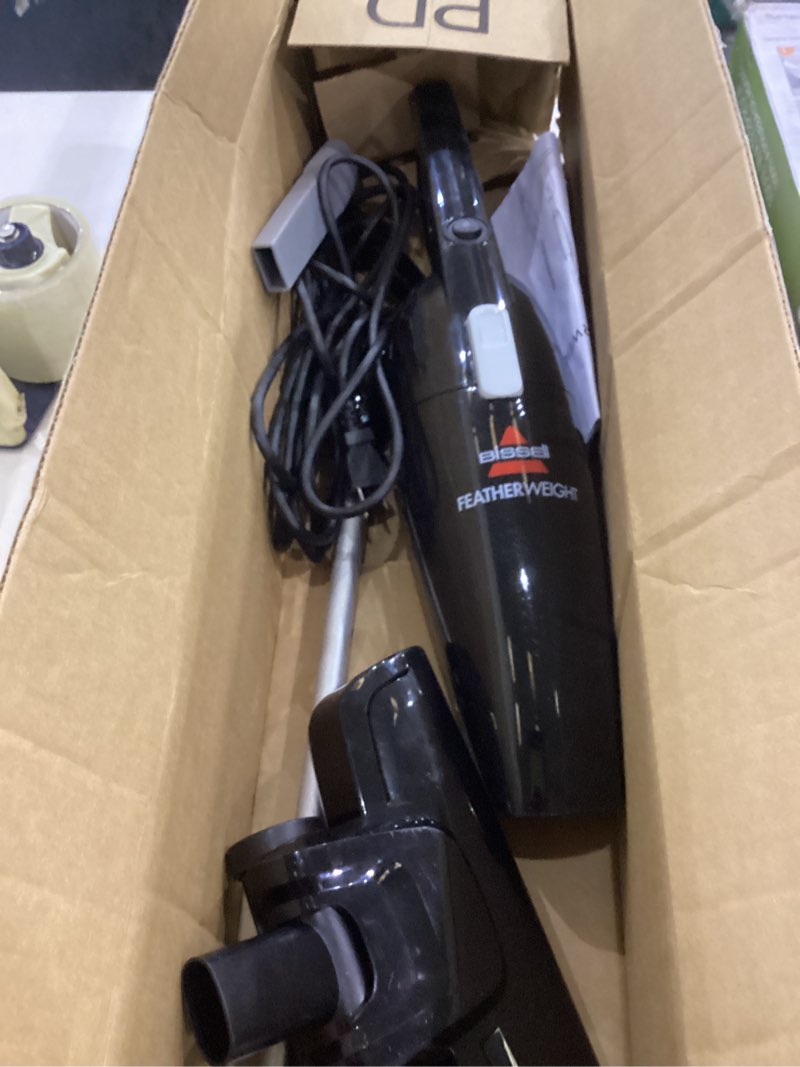 Condition photo showing As Is for BISSELL Featherweight Stick Lightweight Bagless Vacuum with Crevice Tool, 2033M, Black Featherweight (Black)