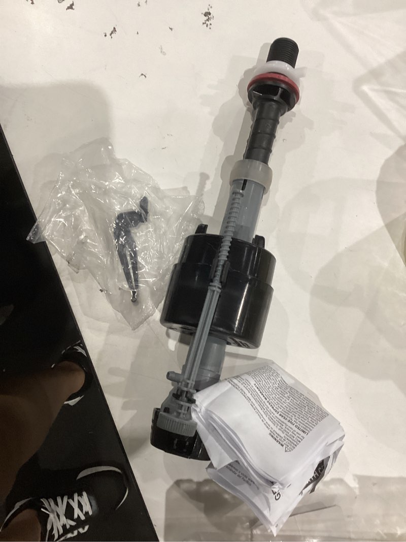 Condition photo showing As Is for fluidmaster toilet fill valve for universal