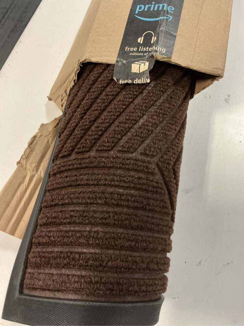 Condition photo showing Good Condition for smiry front door mat outside entrance, heavy duty sturdy natural rubber doormat, trap dirt and moisture, easy clean low profile welcome floor mats for indoor outdoor entry, 47x23 inch, dark brown dark brown irregular triangle rectangular 47" x 23"