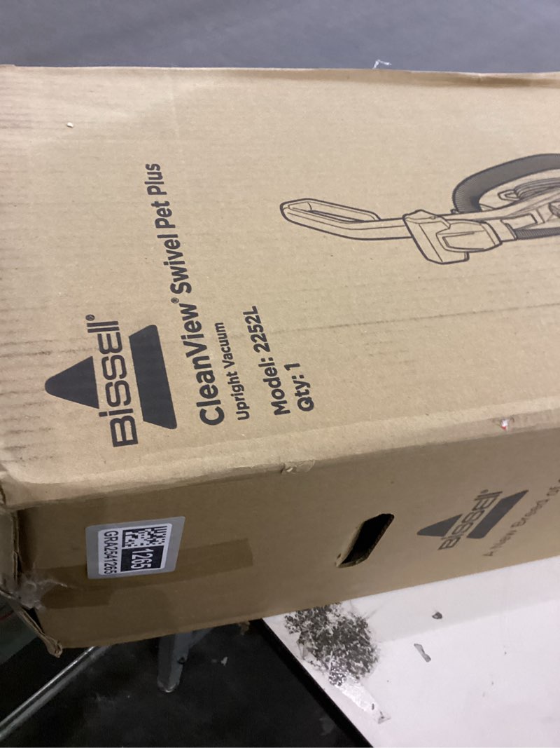 Condition photo showing As Is for Brissell vacuum